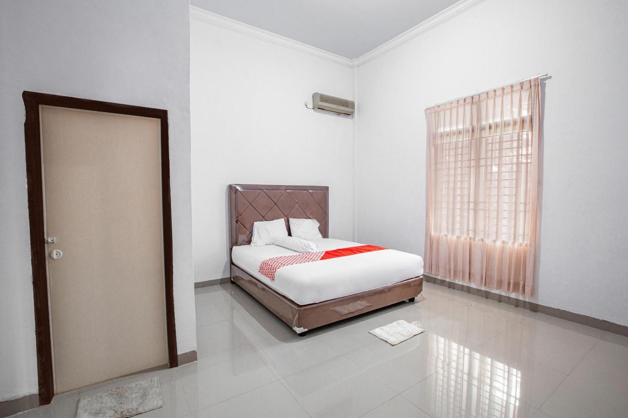 Oyo 92587 Homestay Romauli Kampung Radja جامبي المظهر الخارجي الصورة